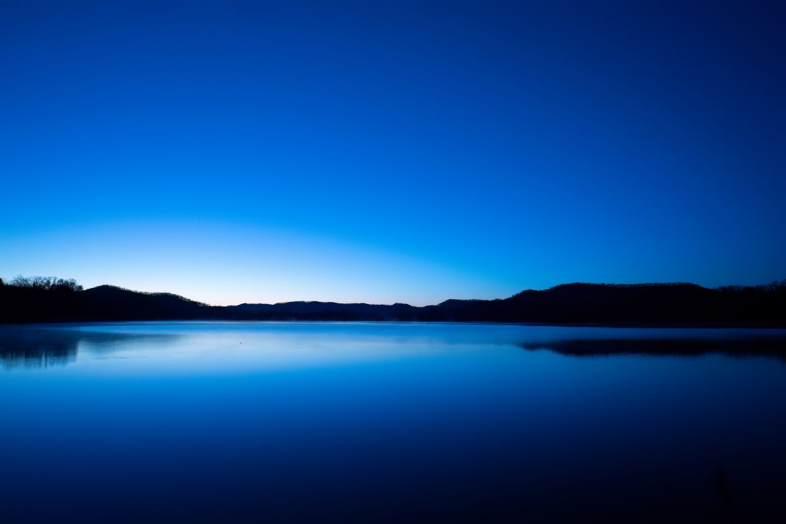 Tranquil lake at dawn