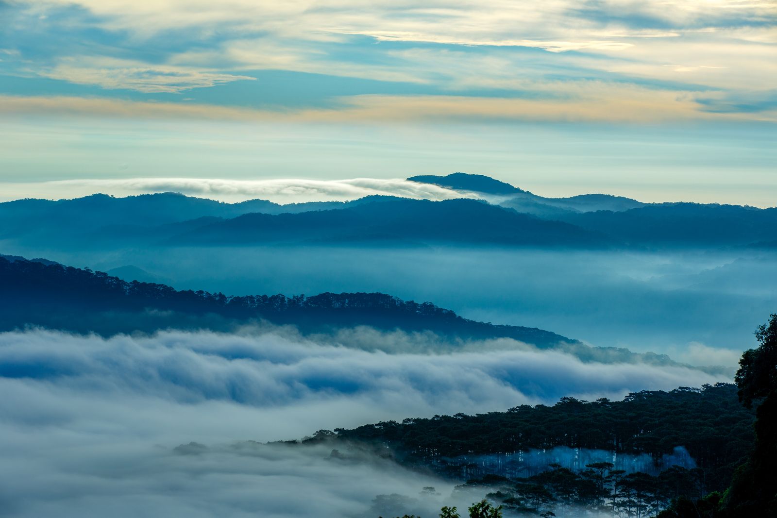 Serene misty mountains at sunrise